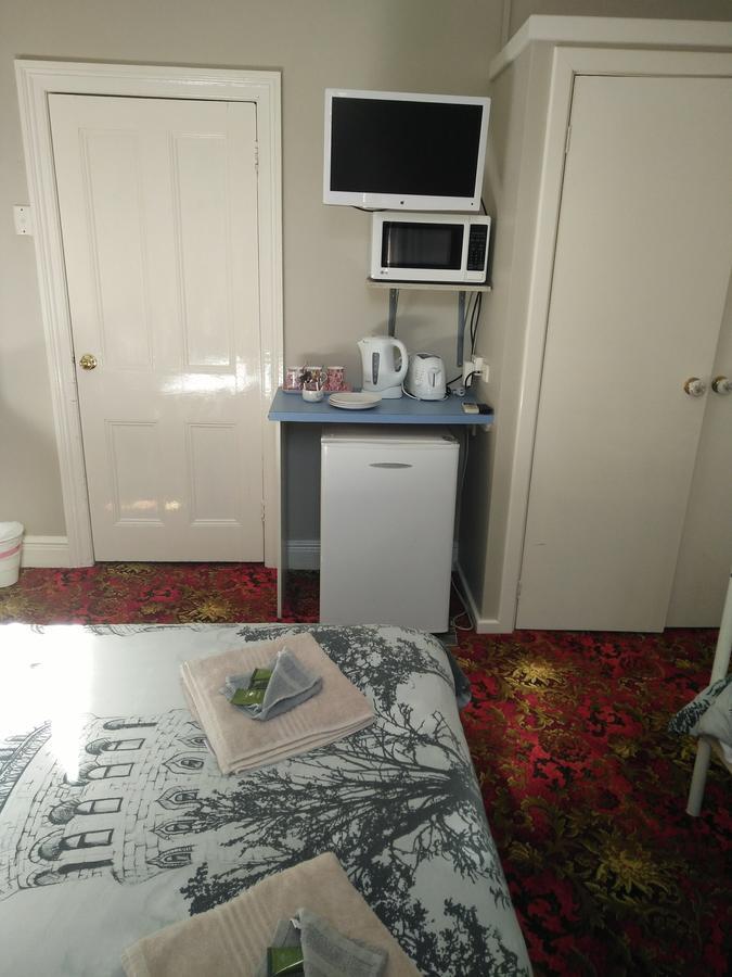 Ithaca 1896 Manor Hotel บัสเซลตัน ภายนอก รูปภาพ